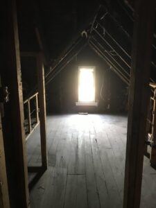 A cleared-out attic space after a clean-out service by Junk Removal and More LLC in Columbus, OH.