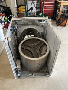 Before and after photo of a garage cleanout service by Your Junk My Trunk Junk Removal in San Antonio, TX.