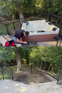 Before and after photo showing the successful removal of a hot tub by Controlled Chaos Services in San Antonio, TX