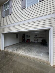 A clean and empty garage after a junk removal service by Junkjet in Charlotte, NC.