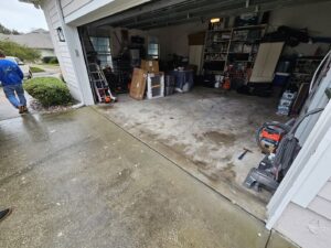 A clean and organized garage after a complete junk removal service by The Mess Haul in Jacksonville, FL.