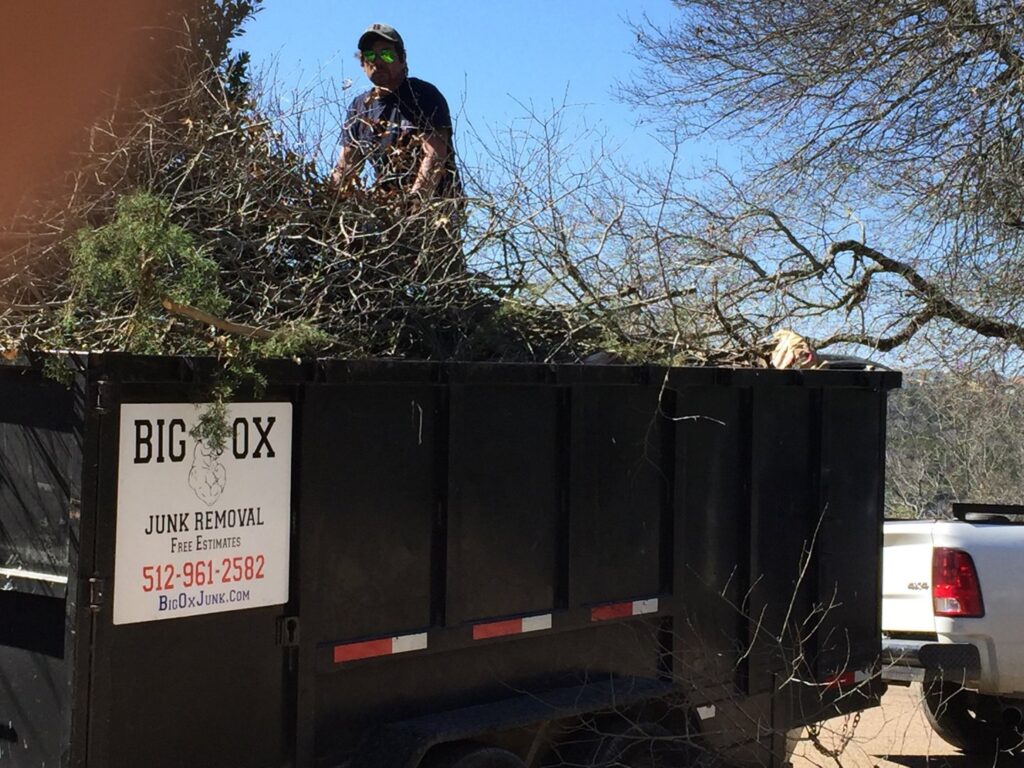 A severely cluttered room, typical of a hoarding or estate cleanout, showing junk before removal by Big Ox Junk Removal in Leander, TX.