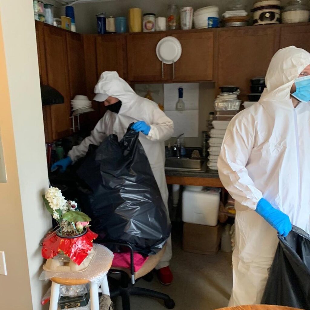A cluttered shed filled with household junk and debris, awaiting cleanup by SQS Junk Removal in Charlotte, NC.