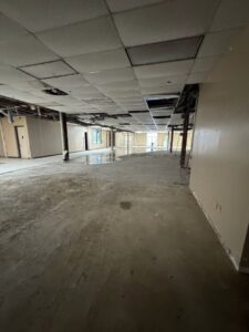 An empty commercial space after a cleanout service by Right On Time Junk Removal in Houston, TX.