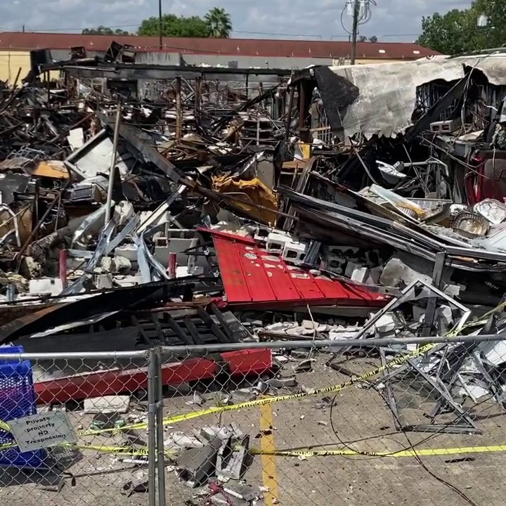 A large pile of debris from a damaged building, ready for removal by Right On Time Junk Removal in Houston, TX.