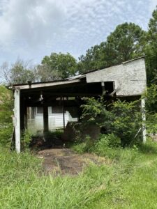 A dilapidated shed requiring debris removal services from Get Junk Help in Houston, TX.