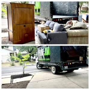 A green 1-800-JUNKPRO dumpster rental placed on a residential driveway with protective boards in Austin, TX.