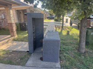 Two pieces of furniture placed on a sidewalk for curbside junk removal by Texas Junk Masters in Fort Worth, TX.