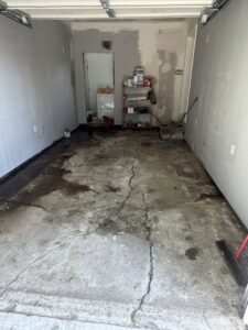 A garage floor after a cleanout service by Right On Time Junk Removal in Houston, TX.