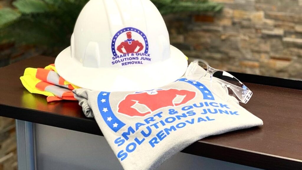 A SQS Junk Removal dumpster parked on a residential driveway in Charlotte, NC, ready for junk collection.