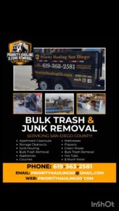 A branded junk removal trailer full of various debris and items, towed by a white truck for Priority Hauling and Junk Removal San Diego, CA.