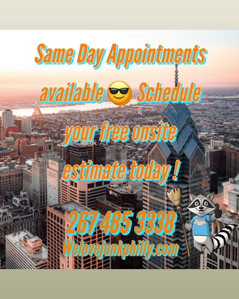 A We Love Junk truck and large dumpsters at a junk removal site in Philadelphia, PA.