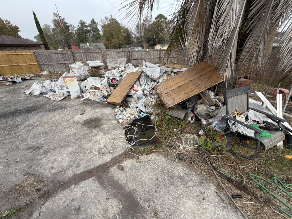 A large pile of outdoor junk and debris awaiting removal by Bring That Junk Removal and Demolition in Jacksonville, FL.