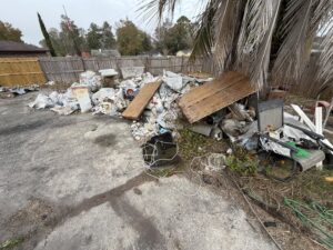 A large pile of outdoor junk and debris awaiting removal by Bring That Junk Removal and Demolition in Jacksonville, FL.