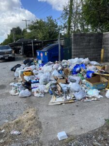 A very large pile of bagged trash and miscellaneous junk ready for removal by Get Junk Help in Houston, TX.
