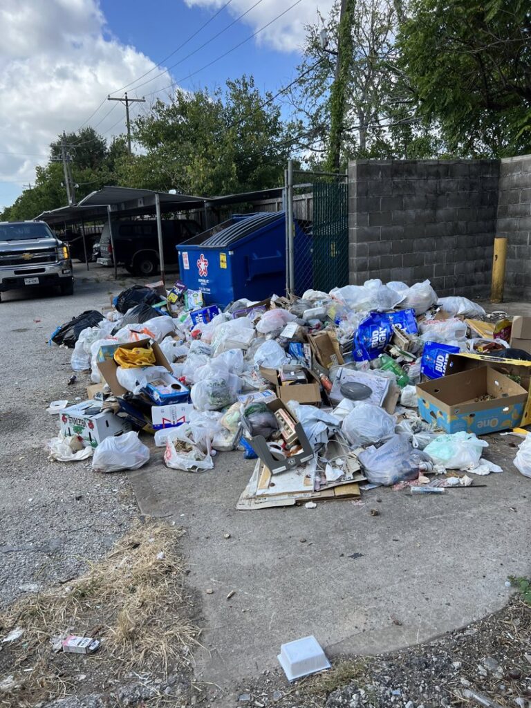 A very large pile of bagged trash and miscellaneous junk ready for removal by Get Junk Help in Houston, TX.