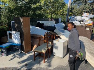 A large pile of mattresses, furniture, and other junk awaiting removal by Two Men and a Junk Truck in Columbus, OH.