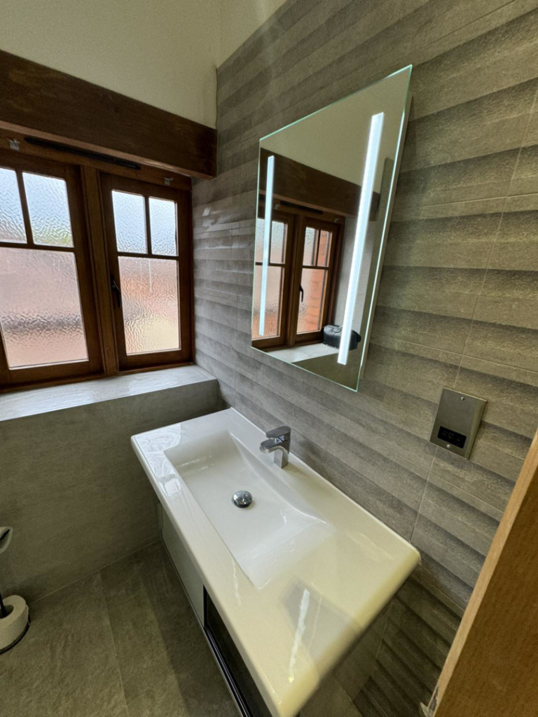 A modern bathroom sink and faucet installation by City Plumbing in Philadelphia, PA