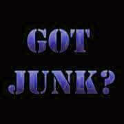 A pickup truck loaded with wood and debris after a junk removal job by Affordable Handyman Junk Removal Services in Charlotte, NC.