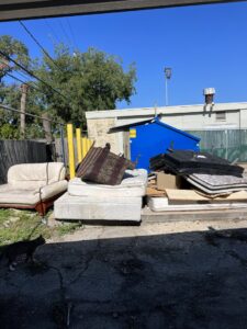 A pile of old furniture and mattresses awaiting general junk removal services from Get Junk Help in Houston, TX.
