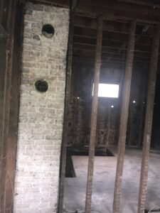 An ongoing residential demolition project with exposed framing by Junk Removal and More LLC in Columbus, OH.