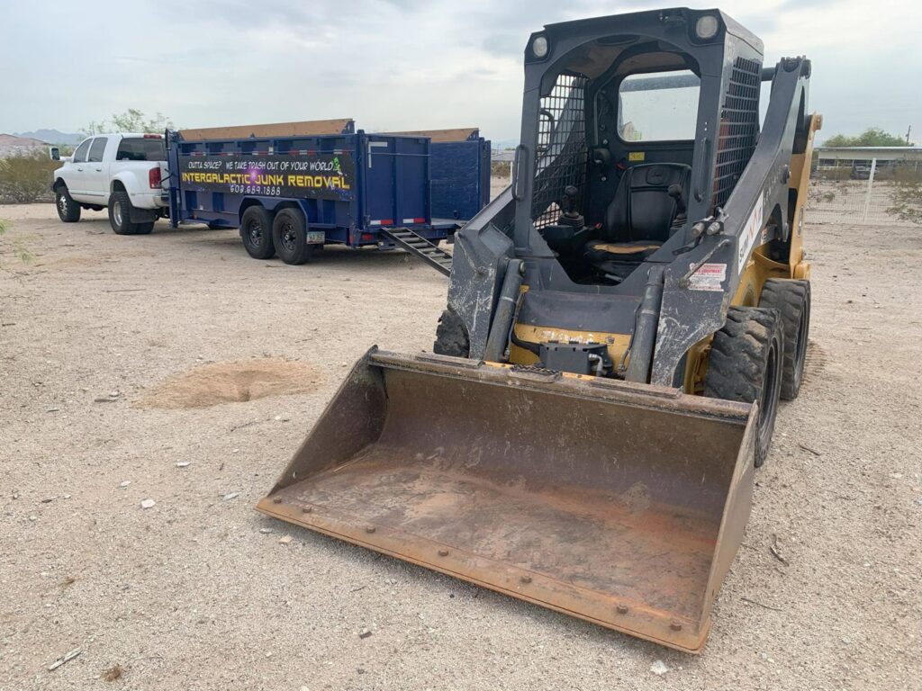 A dump trailer filled with numerous old tires, ready for disposal by Intergalactic Junk Removal in Phoenix, AZ.