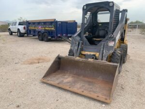 A dump trailer filled with numerous old tires, ready for disposal by Intergalactic Junk Removal in Phoenix, AZ.