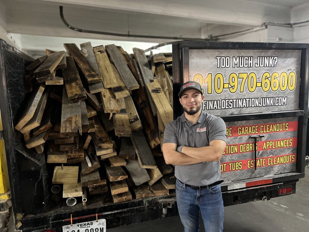 A Final Destination Junk Removal trailer filled with wood debris after a cleanout service in San Antonio, TX.
