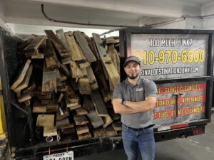 A Final Destination Junk Removal trailer filled with wood debris after a cleanout service in San Antonio, TX.