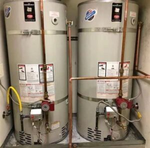 Two water heaters with copper piping installed by Plumbing Services Inc. in San Diego, CA.