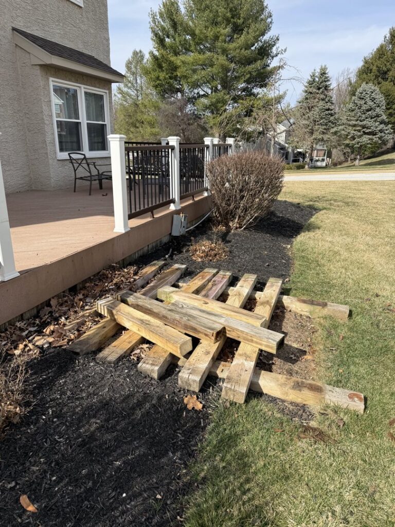 A pile of wooden landscaping timbers ready for removal by Junk to Go in Philadelphia, PA.