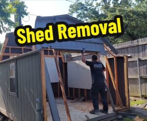 A Lolo Hauling Junk Removal worker dismantling a shed as part of a removal service in Dallas, TX.