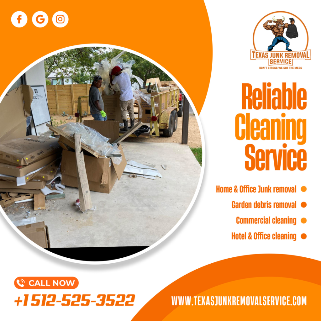 Two workers loading cardboard boxes and various debris onto a trailer for Texas Junk Removal Service in Austin, TX.